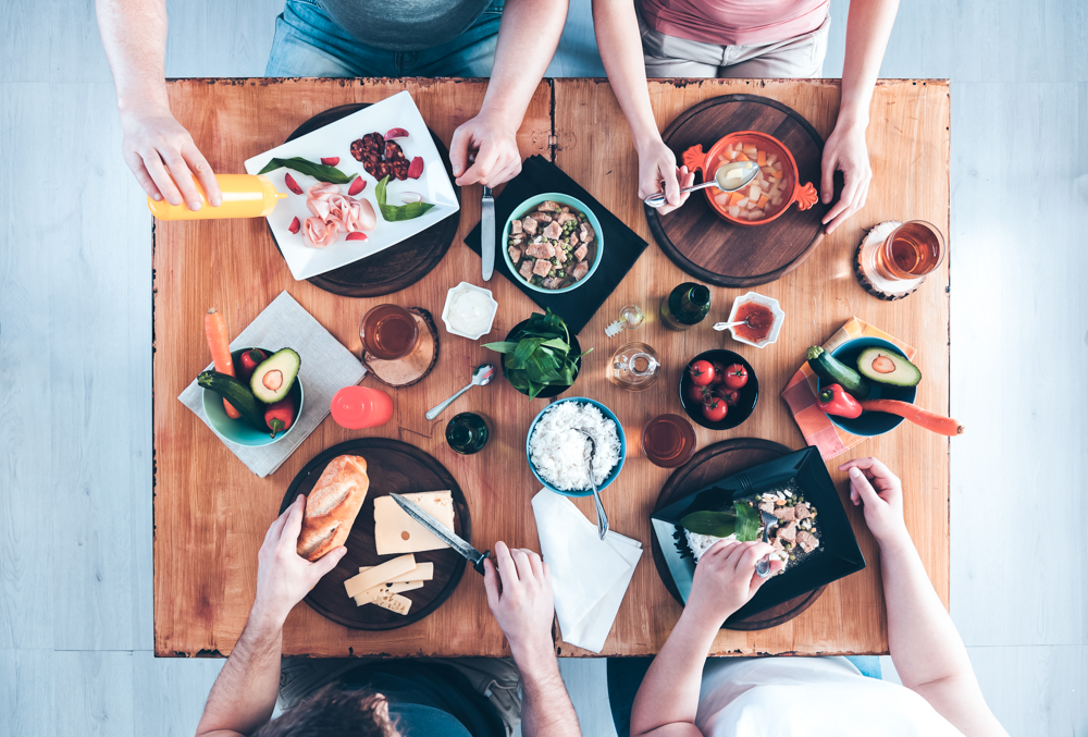 Top view, Group of people sitting at the table having meal